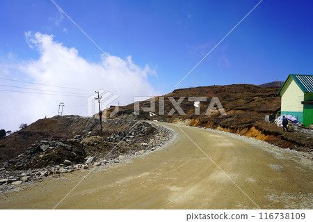 MOUNTAIN ROAD IN SIKKIM DURING THE VISIT IN SILK ROUTE 116738109