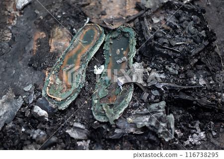the old shoes burned to ashes in a fire the old shoes burned to ashes in a fire 116738295