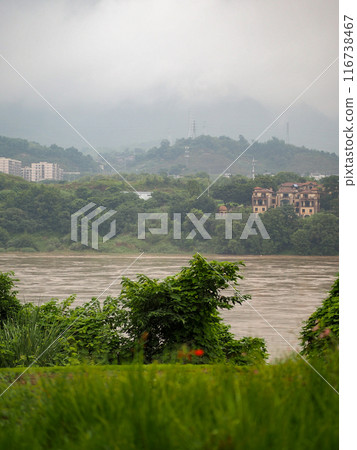 Yangtze river flood close to a Chinese suburb in China. Flood close to warning line of a villa suburb. Yangtze river flood close to a Chinese suburb in China. Flood close to warning line of a villa suburb. 116738467