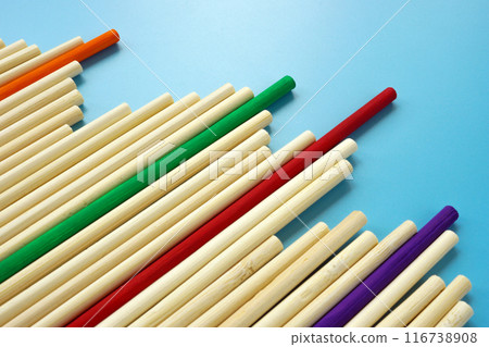 Abstract wooden sticks and colored ones as a concept of success and difference. 116738908