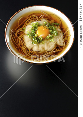 Aerial view of Tsukimi Tororo Soba noodles on a black background 116739137