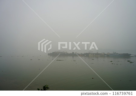 Kolkata Babu Ghat in Foggy Weather during Winter Morning Kolkata Babu Ghat in Foggy Weather during Winter Morning 116739761
