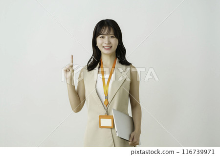 Portrait of a young businesswoman with laptop on white background 116739971