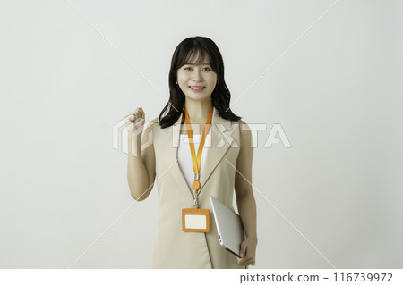 Portrait of a young businesswoman with laptop on white background Portrait of a young businesswoman with laptop on white background 116739972