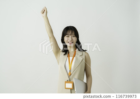 Portrait of a young businesswoman with laptop on white background 116739973