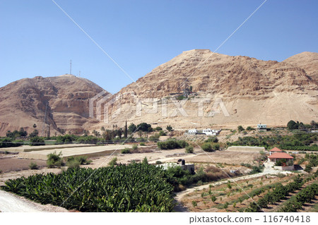 Mount of Temptation near the city of Jericho, Jordan Valley, West Bank, Palestine, Israel Mount of Temptation near the city of Jericho, Jordan Valley, West Bank, Palestine, Israel 116740418