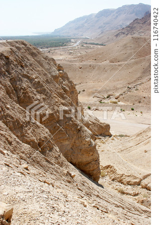 Archaeological site of Qumran where Dead Sea scrolls discovered in caves in cliffs, Judea Desert, Israel, Archaeological site of Qumran where Dead Sea scrolls discovered in caves in cliffs, Judea Desert, Israel, 116740422