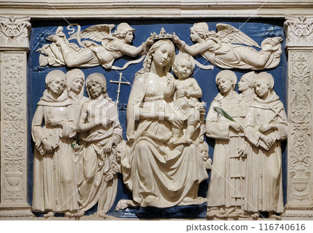 Madonna Enthroned, work by Luca della Robbia, Medici Chapel, Basilica di Santa Croce (Basilica of the Holy Cross) - famous Franciscan church in Florence, Italy Madonna Enthroned, work by Luca della Robbia, Medici Chapel, Basilica di Santa Croce (Basilica of the Holy Cross) - famous Franciscan church in Florence, Italy 116740616