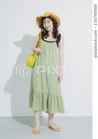 Young woman at summer resort 116740989