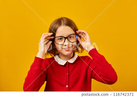 Girl in Red Shirt Wearing Glasses Girl in Red Shirt Wearing Glasses 116742371