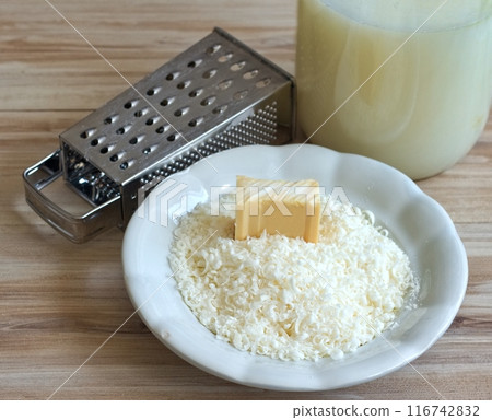 Ingredients for homemade laundry detergent made from grated soap, crystalline sodium and water. Ingredients for homemade laundry detergent made from grated soap, crystalline sodium and water. 116742832