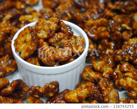 Caramel nuts, walnuts 116743255
