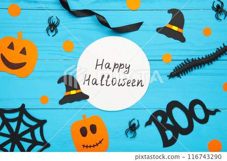 Happy halloween background with decoration on blue wooden background. 116743290