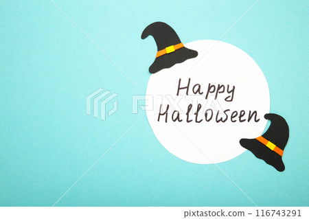 Happy halloween background with witch hat on blue. 116743291