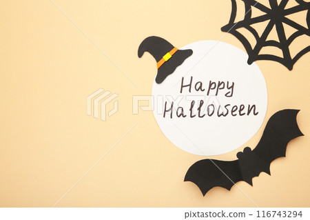 Happy halloween background with decoration on beige. 116743294