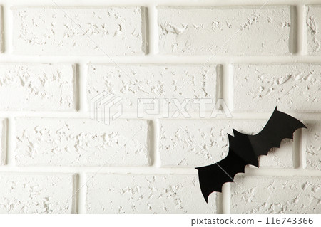 Halloween paper bat on white background. Halloween concept. Halloween paper bat on white background. Halloween concept. 116743366