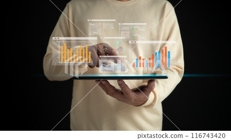 Analysts use tablets and dashboards for marketing analysis, Strategic planning analysis with information on management, Analyze performance and report for operations management, Data analysis concept. Analysts use tablets and dashboards for marketing analysis, Strategic planning analysis with information on management, Analyze performance and report for operations management, Data analysis concept. 116743420