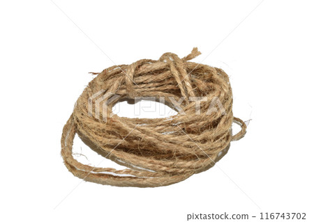 A skein of twine on a white background. 116743702