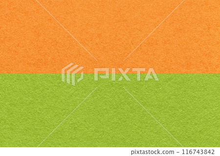 Texture of craft orange and green paper background, half two colors, macro. Vintage ginger cardboard. 116743842