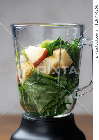 Make a smoothie with a juice blender Make a smoothie with a juice blender 116744256