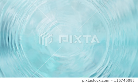Freeze motion of splashing water drops on on light blue background Freeze motion of splashing water drops on on light blue background 116746095