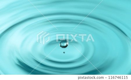 Freeze motion of splashing water drops on on light blue background 116746115