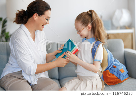 Happy family preparing for school Happy family preparing for school 116746253