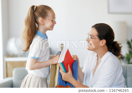 Happy family preparing for school Happy family preparing for school 116746265