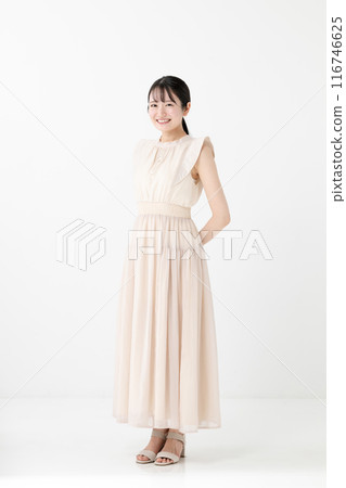 Young woman wearing a dress 116746625