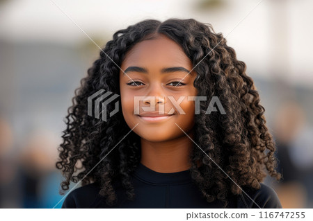 Sunset Serenity: A Beautiful Black Woman by the Sea Sunset Serenity: A Beautiful Black Woman by the Sea 116747255