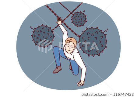 Brave man dodges prickly balls suspended from chain, symbolizing business problems 116747428