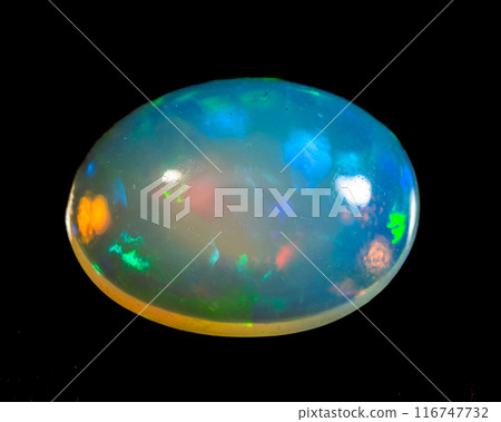natural rainbow opal gem isolated on black background natural rainbow opal gem isolated on black background 116747732