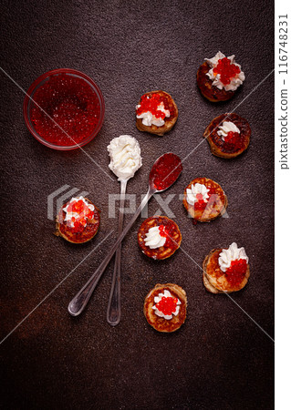 Demidoff pancakes, mini pancakes, with sour cream and red caviar, crepes. homemade, no people, 116748231