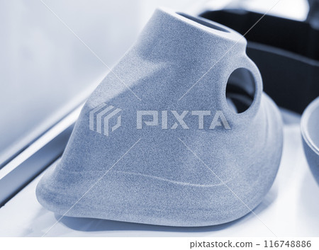 Object from powder plastic printed on 3D printer. Multi Jet Fusion MJF. Created model on industrial 3D printer from polyamide powder. Concept new modern innovation 3D printing technology 116748886