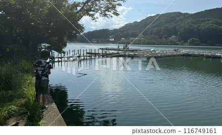 Fishing on a quiet lake 116749161