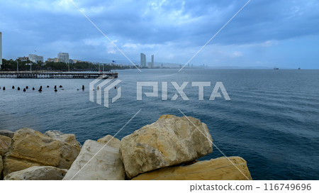 Cyprus, Limassol, Molos seafront promenade and scenic views of Olimpia coast and financial center. Cyprus, Limassol, Molos seafront promenade and scenic views of Olimpia coast and financial center. 116749696