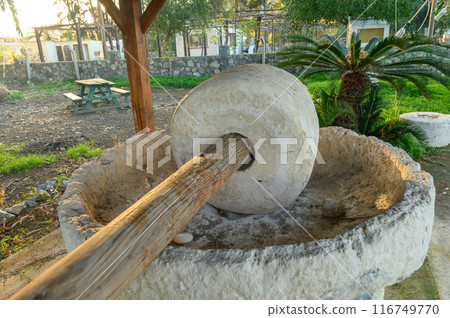 An old stone mill near a restaurant in Cyprus 6 116749770
