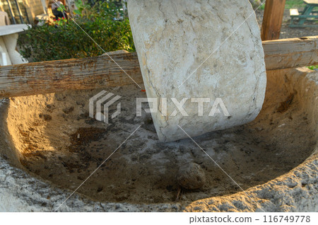 An old stone mill near a restaurant in Cyprus 7 116749778