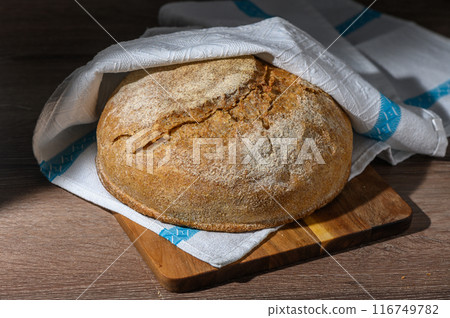 homemade whole grain bread in the kitchen on a wooden table 6 homemade whole grain bread in the kitchen on a wooden table 6 116749782