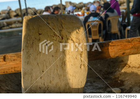 An old stone mill near a restaurant in Cyprus 1 116749940