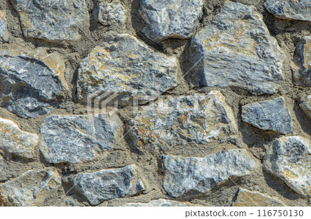 real stone wall as background 116750130