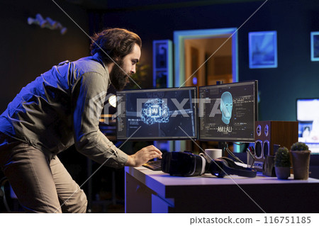 Man typing on keyboard, talking with AI becoming sentient and asking questions about itself. Programmer chatting with artificial intelligence wishing to befriend humanity after becoming self aware Man typing on keyboard, talking with AI becoming sentient and asking questions about itself. Programmer chatting with artificial intelligence wishing to befriend humanity after becoming self aware 116751185