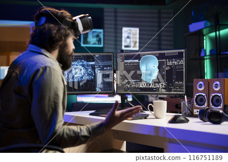 Sentient artificial intelligence with autonomy talking with creator wearing VR headset, asking existential questions. Programmer using virtual reality goggles talks with conscious AI superintelligence Sentient artificial intelligence with autonomy talking with creator wearing VR headset, asking existential questions. Programmer using virtual reality goggles talks with conscious AI superintelligence 116751189