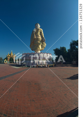 Tilawkasayambhu standing Buddha statue on top of hill for breathtaking views of the fishing boats and the Ngapali Bay,and it is also a famous viewpoint.  Located on the coast of the Bay of Bengal. 116751329