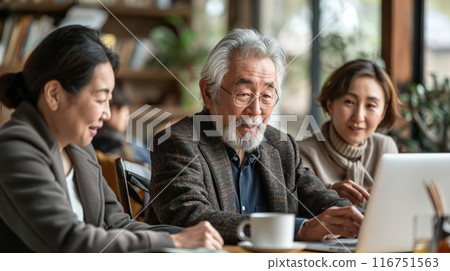 Elderly people learning how to use a computer 116751563