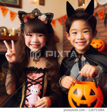 An 8-year-old Japanese boy and a 12-year-old Japanese girl dressed up for Halloween 116751864