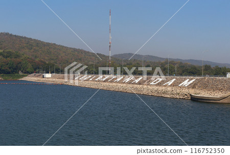 View of Ubonrat Dam during the day with sunlight and clear weather. View of Ubonrat Dam during the day with sunlight and clear weather. 116752350