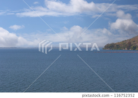 View of Ubonrat Dam during the day with sunlight and clear weather. View of Ubonrat Dam during the day with sunlight and clear weather. 116752352