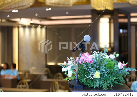 Microphone for speakers at the podium on blurred background. Microphone for speakers at the podium on blurred background. 116752412