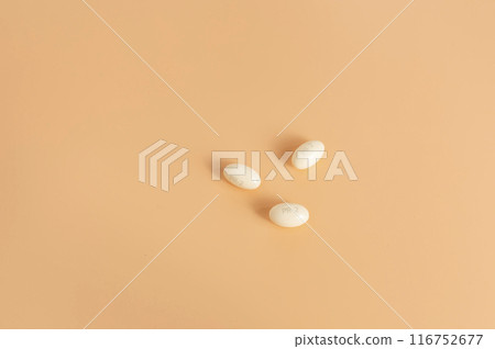 Top View Progesterone Pill, Capsules During Pregnancy On Peach Yellow Background. Dose Of Medications Treats Irregular Menstrual Cycle, Prevents Thicknessing The Lining Of Uterus, Horizontal Copyspace 116752677